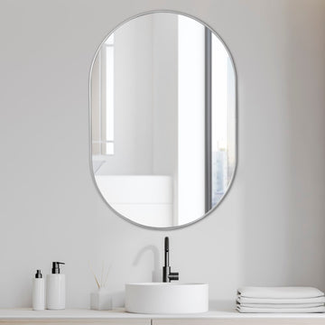 Milly 24 in. W x 36 in. H Medium Oval Metal Framed Wall Mirror - JONATHAN Y